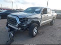 2018 Toyota Tacoma — photo 2 of 16 | VIN 5TFAX5GN9JX119964