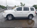 2013 Honda Pilot — photo 14 of 16 | VIN 5FNYF4H96DB061873