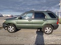 2007 Kia Sportage — photo 14 of 16 | VIN KNDJF724X77384494