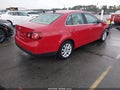 2010 Volkswagen Jetta — photo 4 of 16 | VIN 3VWRX7AJ1AM041963