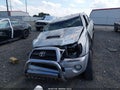 2011 Toyota Tacoma — photo 12 of 16 | VIN 5TFKU4HN0BX001650