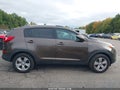 2011 Kia Sportage — photo 13 of 16 | VIN KNDPBCA24B7012768