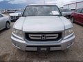 2010 Honda Ridgeline — photo 12 of 16 | VIN 5FPYK1F53AB004575