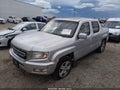 2010 Honda Ridgeline — photo 2 of 16 | VIN 5FPYK1F53AB004575