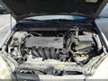 2003 Toyota Corolla — photo 10 of 11 | VIN 1NXBR32E13Z145534