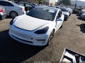 2023 Tesla Model 3 — photo 2 of 21 | VIN 5YJ3E1EA8PF493007