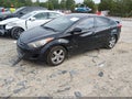 2013 Hyundai Elantra — photo 2 of 12 | VIN 5NPDH4AE7DH399705