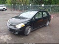 2009 Nissan Versa — photo 2 of 15 | VIN 3N1BC11E19L450002
