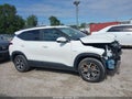 2023 Kia Seltos — photo 13 of 16 | VIN KNDERCAA4P7449509