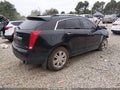 2015 Cadillac SRX — photo 4 of 16 | VIN 3GYFNEE3XFS531777
