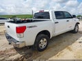 2012 Toyota Tundra — photo 4 of 17 | VIN 5TFEY5F15CX117158