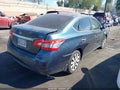 2015 Nissan Sentra — photo 4 of 13 | VIN 3N1AB7AP5FY229049