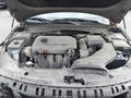 2018 Kia Optima — photo 10 of 17 | VIN 5XXGT4L3XJG266578