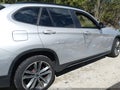 2013 BMW X1 — photo 13 of 15 | VIN WBAVL1C51DVR92097