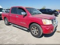 2007 Nissan Titan — photo 1 of 13 | VIN 1N6BA07A17N228765