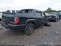 2013 Honda Ridgeline — photo 4 of 17 | VIN 5FPYK1F77DB007954
