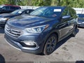 2017 Hyundai Santa Fe — photo 2 of 16 | VIN 5XYZWDLA5HG492936