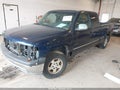 2000 Chevrolet Silverado — photo 2 of 16 | VIN 1GCEK19T6YE397117
