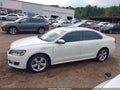 2013 Volkswagen Passat — photo 14 of 16 | VIN 1VWBP7A31DC060702