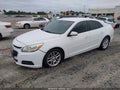 2014 Chevrolet Malibu — photo 2 of 16 | VIN 1G11C5SLXEF286226