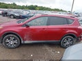 2018 Toyota RAV4 — photo 14 of 16 | VIN 2T3BFREV5JW713697