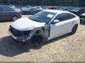 2019 Honda Civic — photo 2 of 20 | VIN 19XFC2F64KE015619