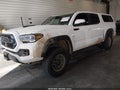 2021 Toyota Tacoma — photo 2 of 16 | VIN 5TFCZ5AN2MX261332