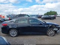 2018 Kia Optima — photo 14 of 17 | VIN 5XXGT4L38JG253361