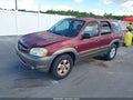 2004 Mazda Tribute — photo 2 of 11 | VIN 4F2YZ04194KM29031