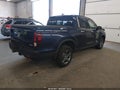 2023 Honda Ridgeline — photo 4 of 17 | VIN 5FPYK3F7XPB013084