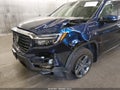 2023 Honda Ridgeline — photo 6 of 17 | VIN 5FPYK3F7XPB013084