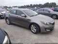 2013 Kia Optima — photo 1 of 16 | VIN 5XXGN4A79DG171384
