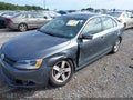 2014 Volkswagen Jetta — photo 2 of 16 | VIN 3VWLL7AJ1EM398342
