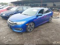 2016 Honda Civic — photo 2 of 17 | VIN 19XFC1F30GE205747