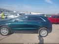 2024 Cadillac XT4 — photo 13 of 15 | VIN 1GYFZBR40RF227100