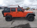 2015 Jeep Wrangler Unlimited — photo 14 of 17 | VIN 1C4BJWFGXFL676329