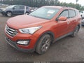 2014 Hyundai Santa Fe — photo 2 of 14 | VIN 5XYZU3LB5EG186260