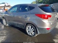 2012 Hyundai Tucson — photo 3 of 19 | VIN KM8JUCAC1CU355335