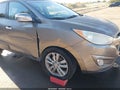 2012 Hyundai Tucson — photo 6 of 19 | VIN KM8JUCAC1CU355335