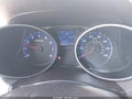2012 Hyundai Tucson — photo 7 of 19 | VIN KM8JUCAC1CU355335