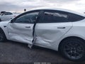 2022 Tesla Model 3 — photo 13 of 17 | VIN 5YJ3E1EBXNF206501