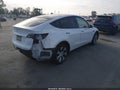 2021 Tesla Model Y — photo 4 of 19 | VIN 5YJYGDEE4MF141705