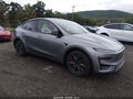 2026 Tesla Model Y — photo 1 of 10 | VIN 7SAYGDET1TA675192