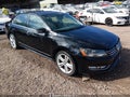 2014 Volkswagen Passat — photo 1 of 16 | VIN 1VWCS7A32EC025588