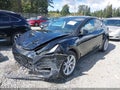 2023 Tesla Model Y — photo 2 of 20 | VIN 7SAYGDEE3PF807069