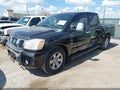 2005 Nissan Titan — photo 2 of 11 | VIN 1N6AA07A15N500191