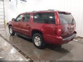 2010 Chevrolet Suburban 1500 — photo 3 of 17 | VIN 1GNUKJE30AR257619
