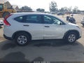 2014 Honda CR-V — photo 13 of 16 | VIN 5J6RM3H33EL015667