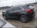 2019 Cadillac XT5 — photo 14 of 16 | VIN 1GYKNCRS2KZ249621