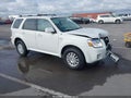 2009 Mercury Mariner — photo 1 of 17 | VIN 4M2CU97G49KJ19562
